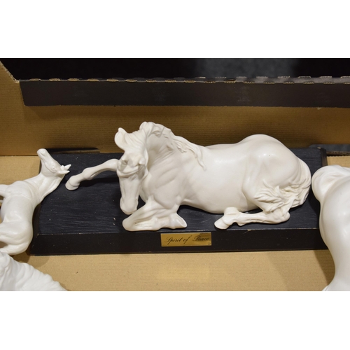 129 - Beswick matt white horses to include Adventure, an example on a ceramic base, Spirit of Peace and Sp... 