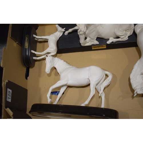 129 - Beswick matt white horses to include Adventure, an example on a ceramic base, Spirit of Peace and Sp... 