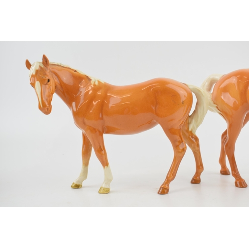 131 - Beswick palomino horses to include a swishtail and a mare facing left (2).