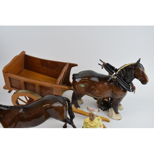 134 - Beswick to include Susie Jamaica (ear chipped), an 818 shire horse with tack and cart, with a brown ... 