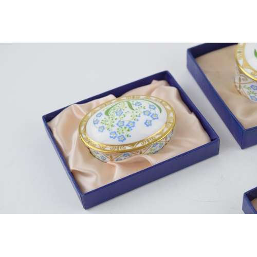 17 - A set of four Royal Crown Derby Forget-Me-Not pattern graduated oval trinket dishes and covers, the ... 