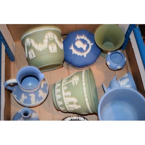 268 - Wedgwood Jasperware in varying colours to include blue, green, black and royal blue to include a tan... 