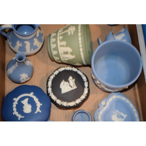 268 - Wedgwood Jasperware in varying colours to include blue, green, black and royal blue to include a tan... 