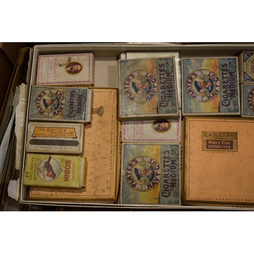 299 - A good collection of vintage stamps, cigarette cards, cigarette packets, tins and other ephemera. (Q... 