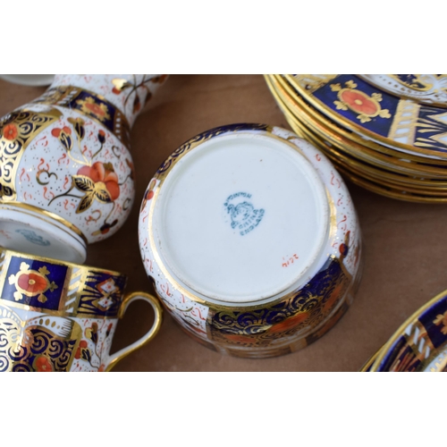 32 - A collection of Ford and Pointon Imari tea ware to include 10 cups, 10 saucers, 10 side plates, a mi... 