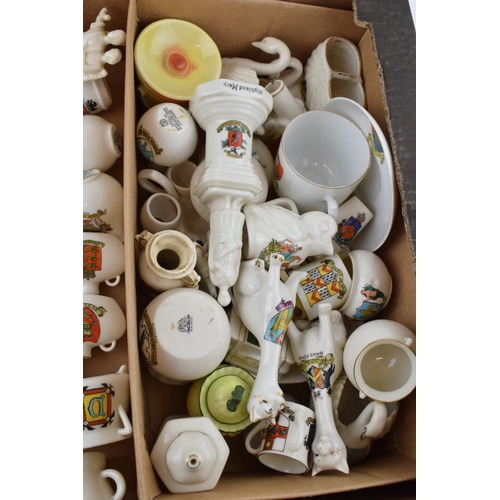 42 - A collection of crested china items to include animals, jugs, vases and varying forms and decoration... 