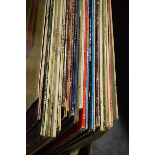 442 - A collection of vinyl LPs to include artists Waylon Jennings, Dianna Ross, Four Tops and various Tam... 