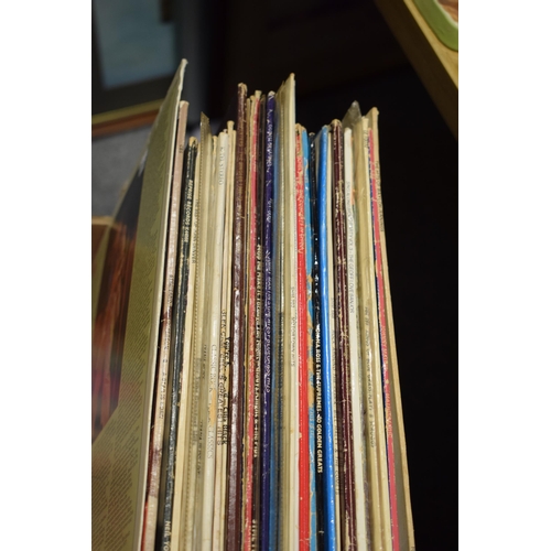 442 - A collection of vinyl LPs to include artists Waylon Jennings, Dianna Ross, Four Tops and various Tam... 