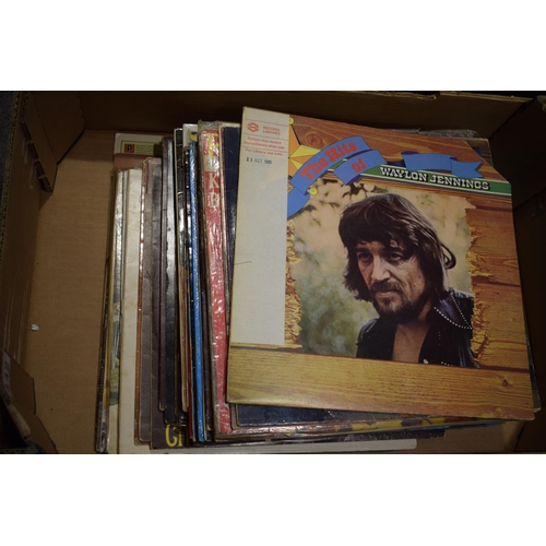 442 - A collection of vinyl LPs to include artists Waylon Jennings, Dianna Ross, Four Tops and various Tam... 