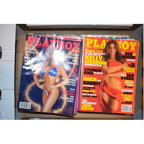 595 - A collection of Playboy Magazines. Approx 50 editions dating from the 2000s.