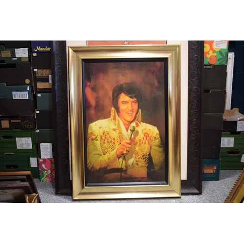 613 - Elvis Presley: a large giclee on canvas of The King, titled 'American Eagle 75' by Graceland Artist,... 