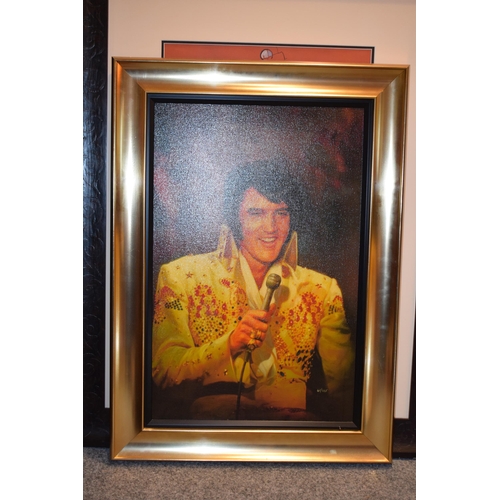 613 - Elvis Presley: a large giclee on canvas of The King, titled 'American Eagle 75' by Graceland Artist,... 