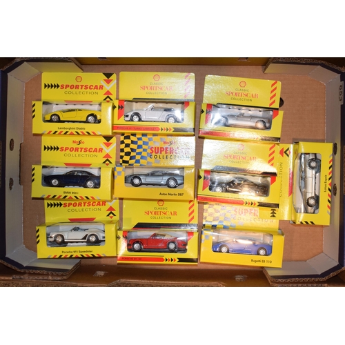 653 - A collection of boxed toy cars. Maisto Sports Cars. (10)