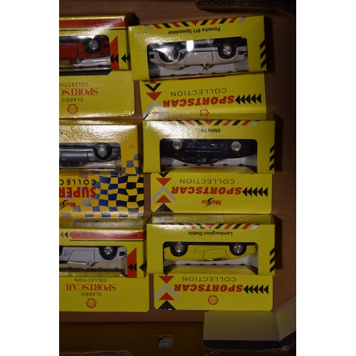 653 - A collection of boxed toy cars. Maisto Sports Cars. (10)