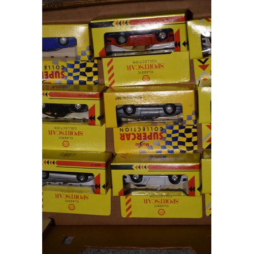 653 - A collection of boxed toy cars. Maisto Sports Cars. (10)