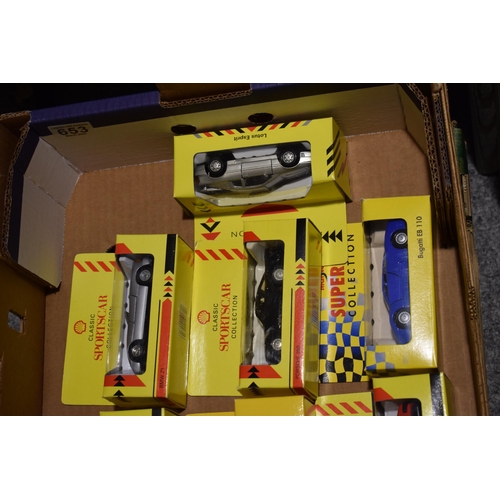 653 - A collection of boxed toy cars. Maisto Sports Cars. (10)