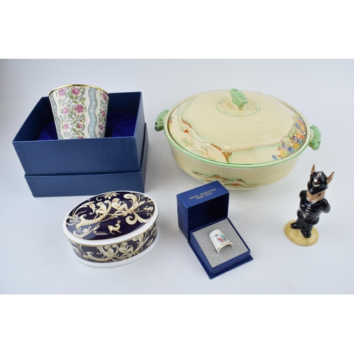 66 - Pottery to include a Royal Doulton Policeman Bunnykins, a Wedgwood Cornucopia trinket, a Halcyon Day... 