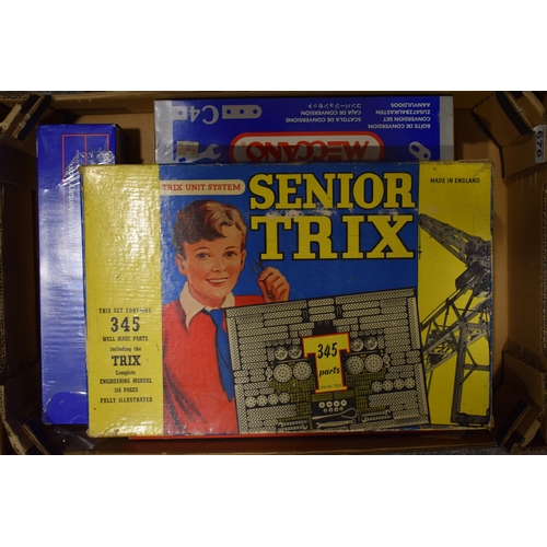 676 - A collection of vintage and contempory Meccano and Senior Trix sets to include Meccano box 4, C4 set... 