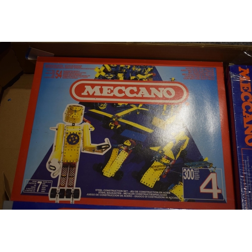 676 - A collection of vintage and contempory Meccano and Senior Trix sets to include Meccano box 4, C4 set... 