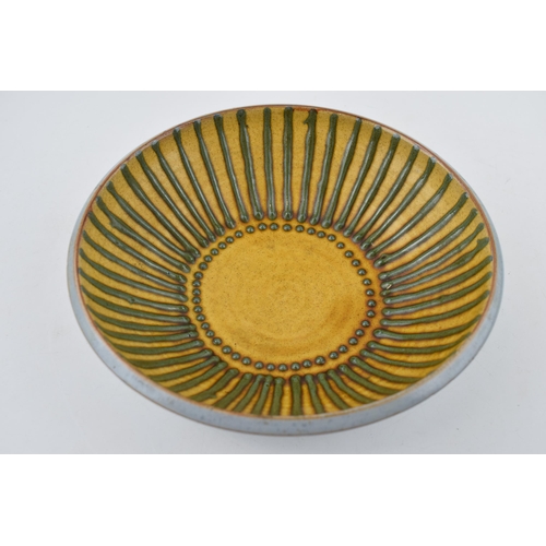 68 - A studio pottery stoneware bowl, with green on mustard yellow decoration, 20.5cm diameter, stamped '... 