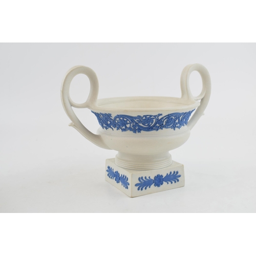 85 - An early 19th century Wedgwood sprig moulded jasperware two-handled vessel in the classical manner, ... 