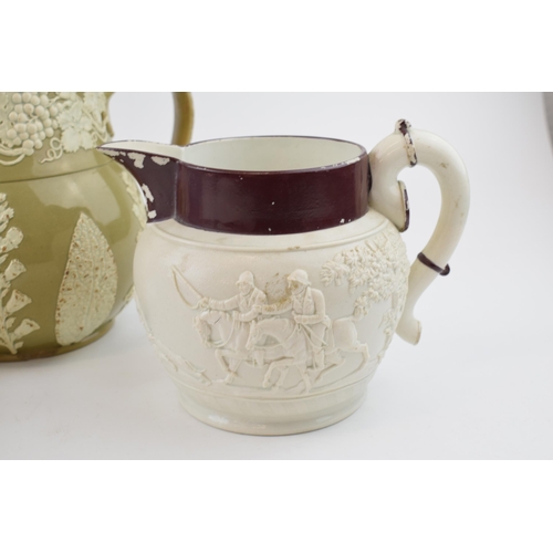 87 - A group of three early 19th century moulded jugs, c. 1810-30. To include a Davenport feldspathic hun... 