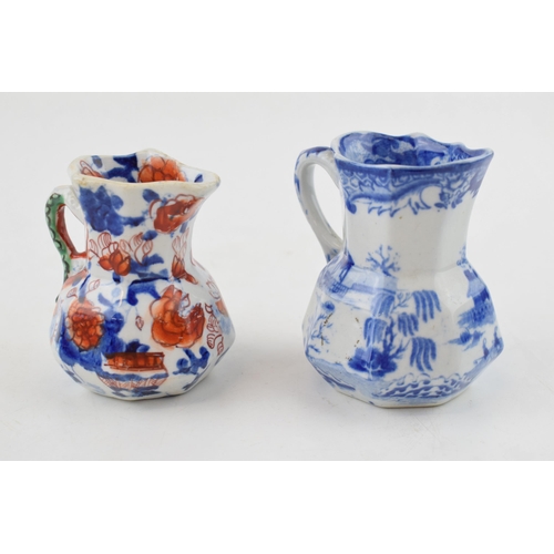 90 - Two early 19th century Masons hydra jugs, c. 1825-40. One is blue-printed and the other is decorated... 