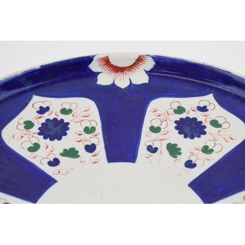 92 - A large mid-19th century hand-painted charger with a geometric design, impressed FENTON, c. 1840. 41... 