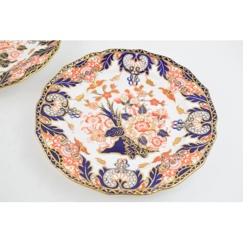 95 - A pair of Derby hand-painted porcelain plates in pattern 383, c. 1880s. 22cm wide.