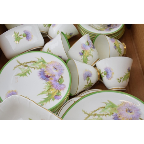 174 - Royal Doulton tea ware in the Glamis Thistle pattern, to include 8 cups, 7 saucers, 8 side plates, 2... 