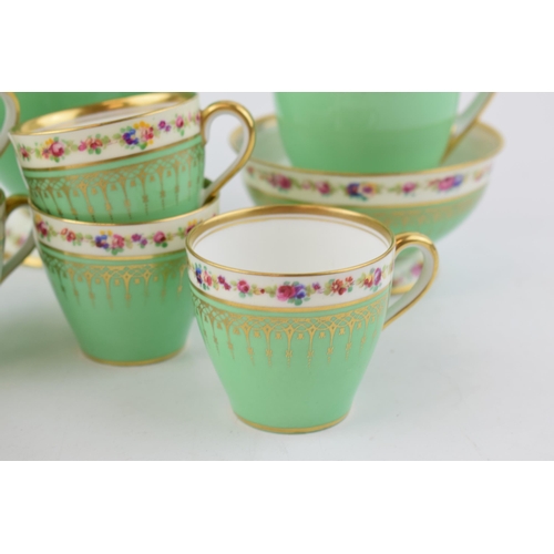 175 - Royal Doulton green and gilt coffee set with floral decoration to include a coffee pot, 6 cups, 6 sa... 