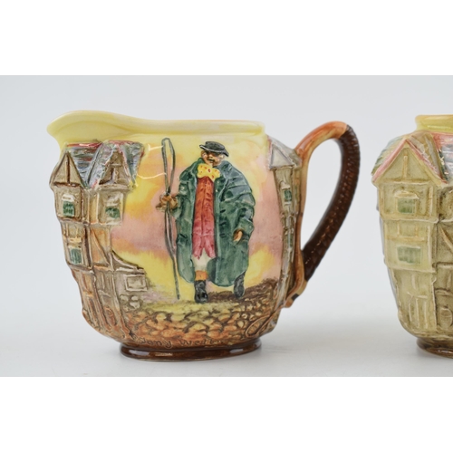 179 - A trio of Royal Doulton embossed Dickens ware jugs to include Tony Weller, Sam Weller and another To... 