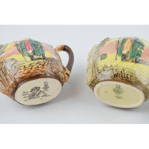 179 - A trio of Royal Doulton embossed Dickens ware jugs to include Tony Weller, Sam Weller and another To... 