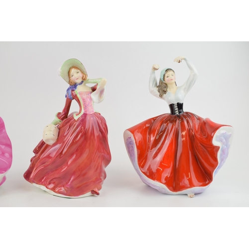 181 - A collection of Royal Doulton figures to include HN3703 'Belle' HN1934 'Autumn Breezes', 2388 'Karen... 