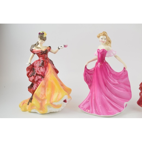 181 - A collection of Royal Doulton figures to include HN3703 'Belle' HN1934 'Autumn Breezes', 2388 'Karen... 