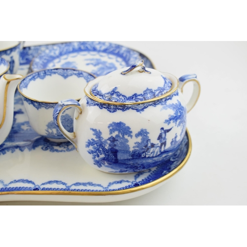 186 - Royal Doulton Watteau flow blue tea set to include a large serving tray, a teapot, a sucrier and a c... 