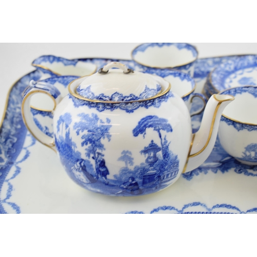 186 - Royal Doulton Watteau flow blue tea set to include a large serving tray, a teapot, a sucrier and a c... 