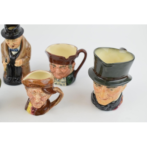 189 - Royal Doulton to include Sir Winston Churchill Toby jug, miniature character jugs to include Micawbe... 