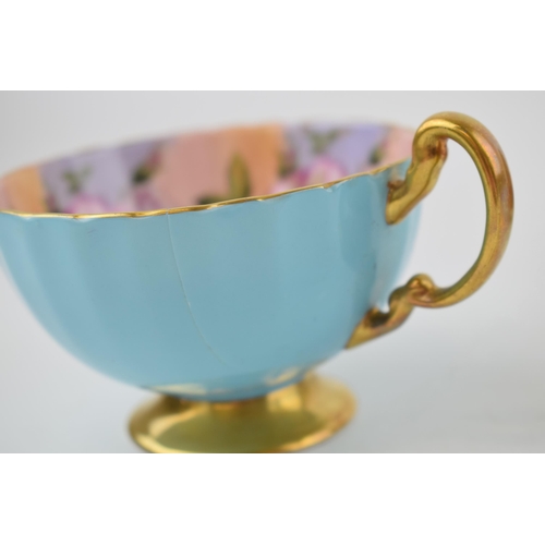 246 - A collection of Aynsley hand painted cups to include an Orchard Gold cup and saucer, another cup wit... 