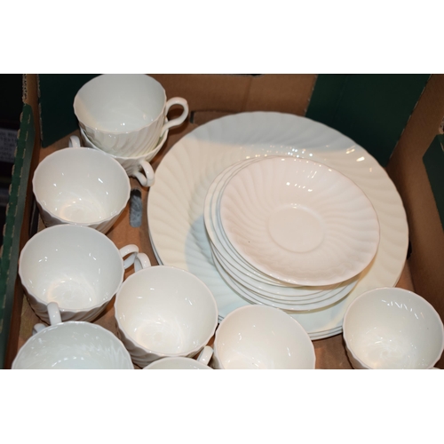 248 - Minton undecorated tea and dinner service items to include 10 cups and saucers, cream jug and sugar ... 