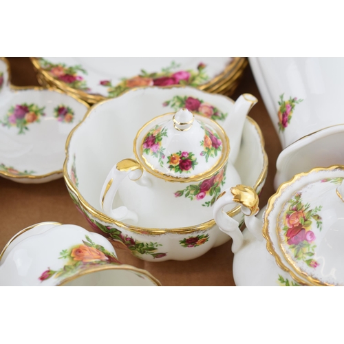 251 - Royal Albert Old Country Roses to include an extra small teapot, a pair of ribbed vases, 6 trios, a ... 