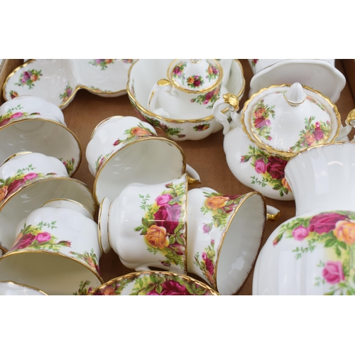 251 - Royal Albert Old Country Roses to include an extra small teapot, a pair of ribbed vases, 6 trios, a ... 