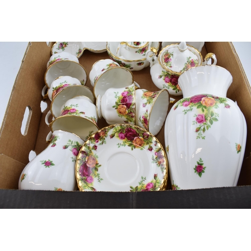 251 - Royal Albert Old Country Roses to include an extra small teapot, a pair of ribbed vases, 6 trios, a ... 