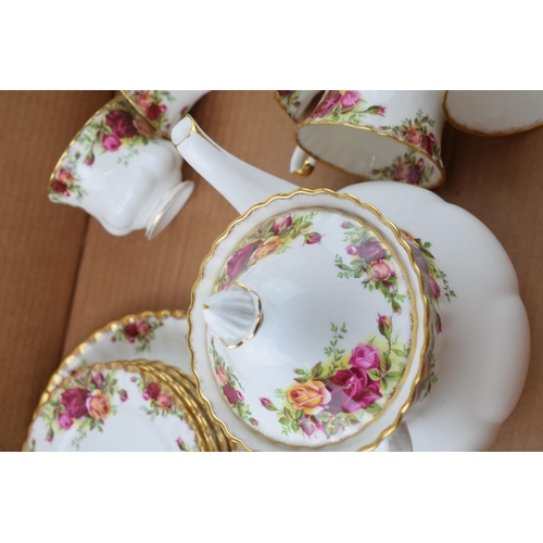 252 - Royal Albert Old Country Roses to include a large teapot, 6 trios, a cake plate, a milk jug and a su... 