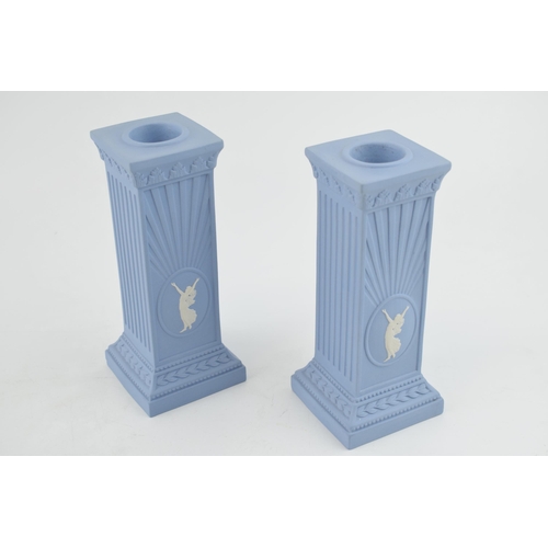 260 - Wedgwood Dancing Hours square column candlesticks, 15cm tall (2).