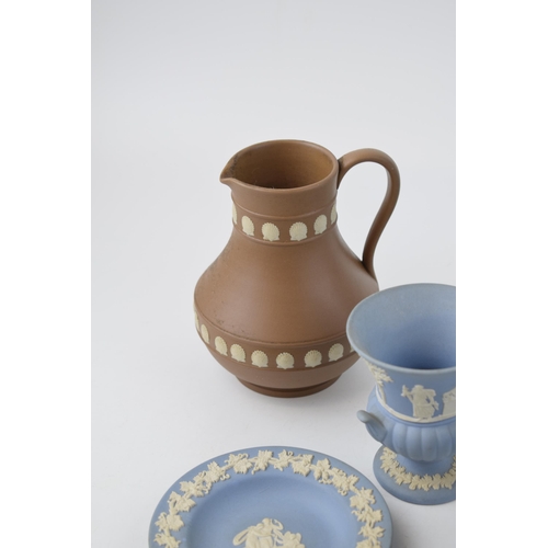 262 - A collection of Wedgwood Jasperware and Queensware items to include a Queensware vase height 27cm. A... 