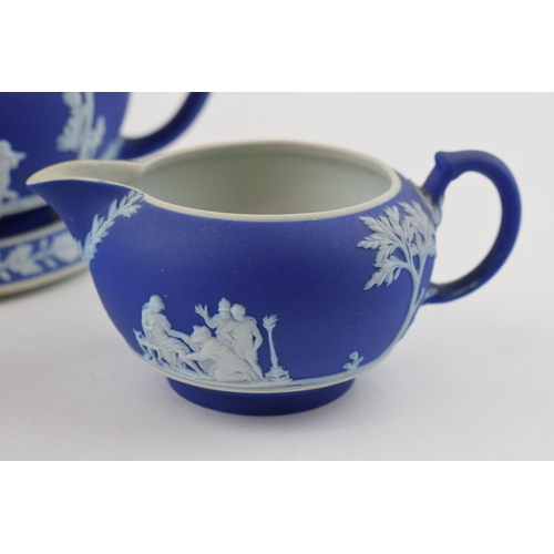 269 - A collection of Wedgwood Jasperware 'blue dip' items to include teapot (Height 13cm) and stand, suga... 