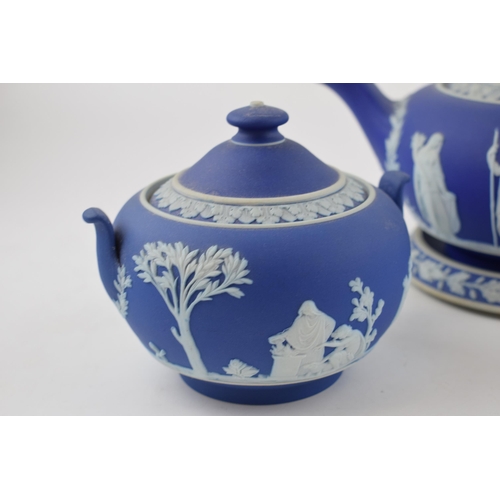 269 - A collection of Wedgwood Jasperware 'blue dip' items to include teapot (Height 13cm) and stand, suga... 