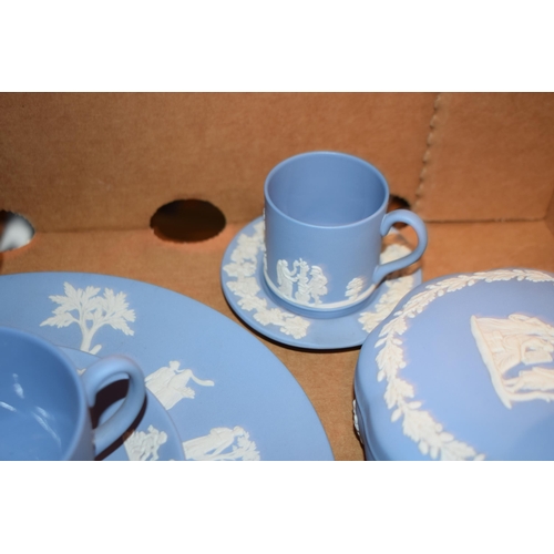 271 - Wedgwood Jasperware in Blue to include a cup and saucer, a coffee can, a jug, a plate and others.