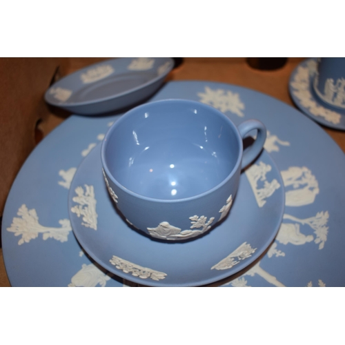 271 - Wedgwood Jasperware in Blue to include a cup and saucer, a coffee can, a jug, a plate and others.